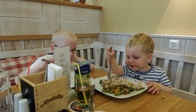 two children eating food