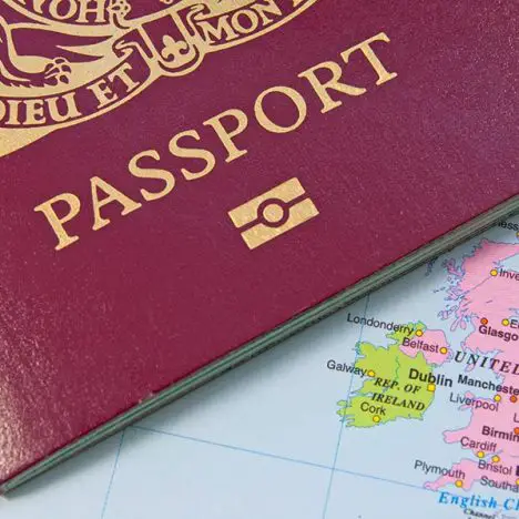 Closeup of a british passport on a map