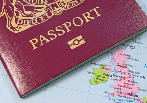 Closeup of a british passport on a map