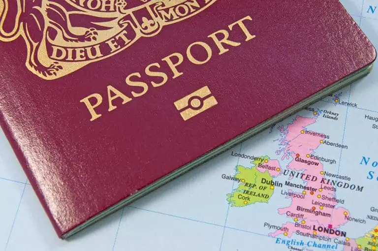 Closeup of a british passport on a map