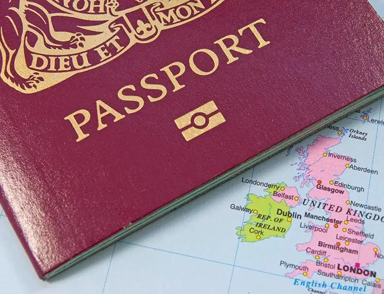 Closeup of a british passport on a map