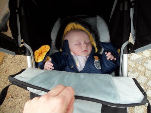 Baby sleeping in pram