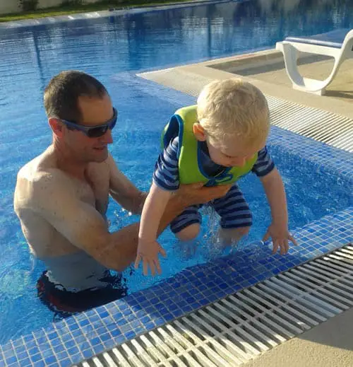 Learning to swim on a villa holiday with kids