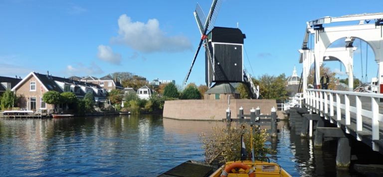 Leiden windmill with boat in foreground
