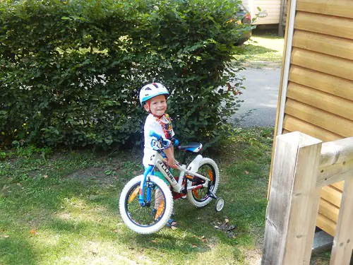 Boy with his bike in France