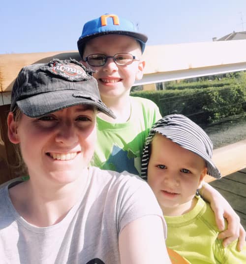 Mother and sons smiling for a selfie