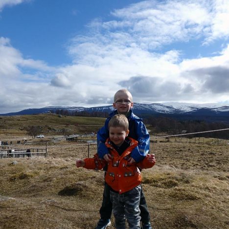 Two young boys in the Scottish Highlands