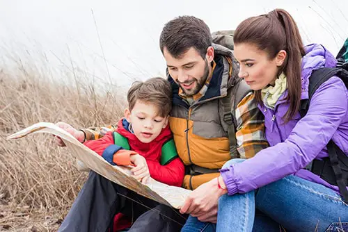 family looking at a map