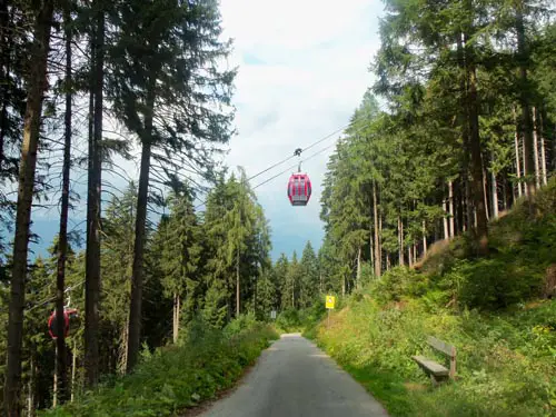 cable car going over hiking trail
