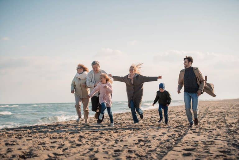multi-generational family on a beach