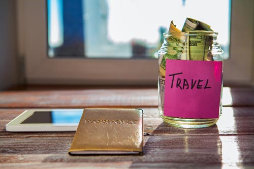 objects for travel isolated on a wooden background