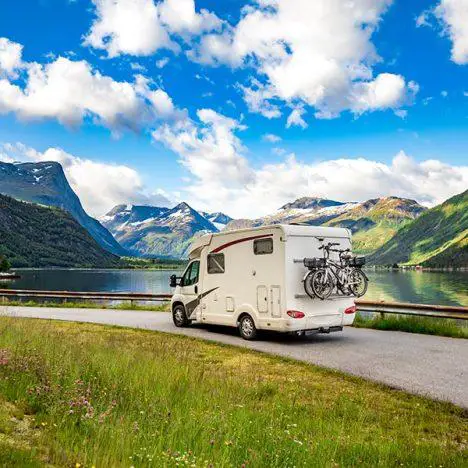 Family vacation travel RV, holiday trip in motorhome, Caravan car Vacation. Beautiful Nature Norway natural landscape.