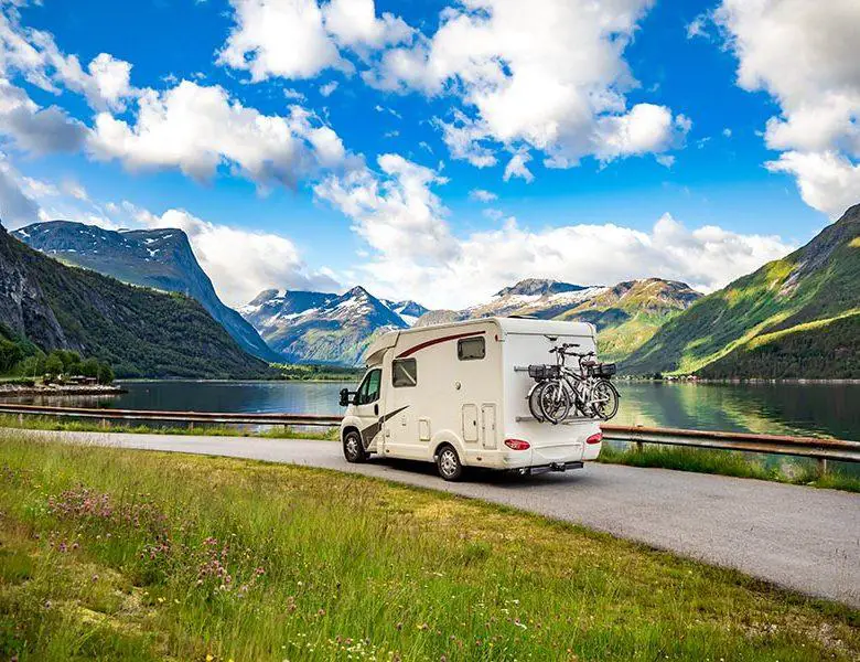 Family vacation travel RV, holiday trip in motorhome, Caravan car Vacation. Beautiful Nature Norway natural landscape.